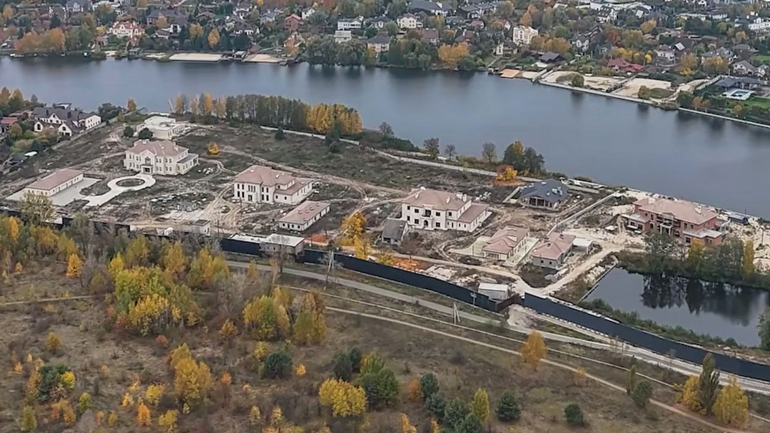 An aerial view shows a luxury residential compound at the center of Ukraine’s biggest corruption probe near Kyiv, Ukraine, in an undated video. 