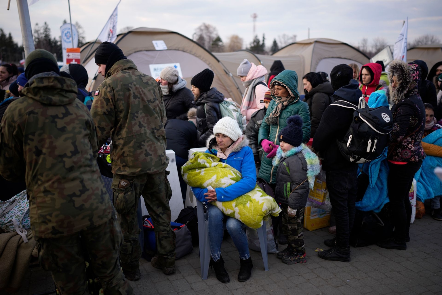 Ukrainian refugees arrive at the Medyka border crossing in Poland, on March 10, 2022.