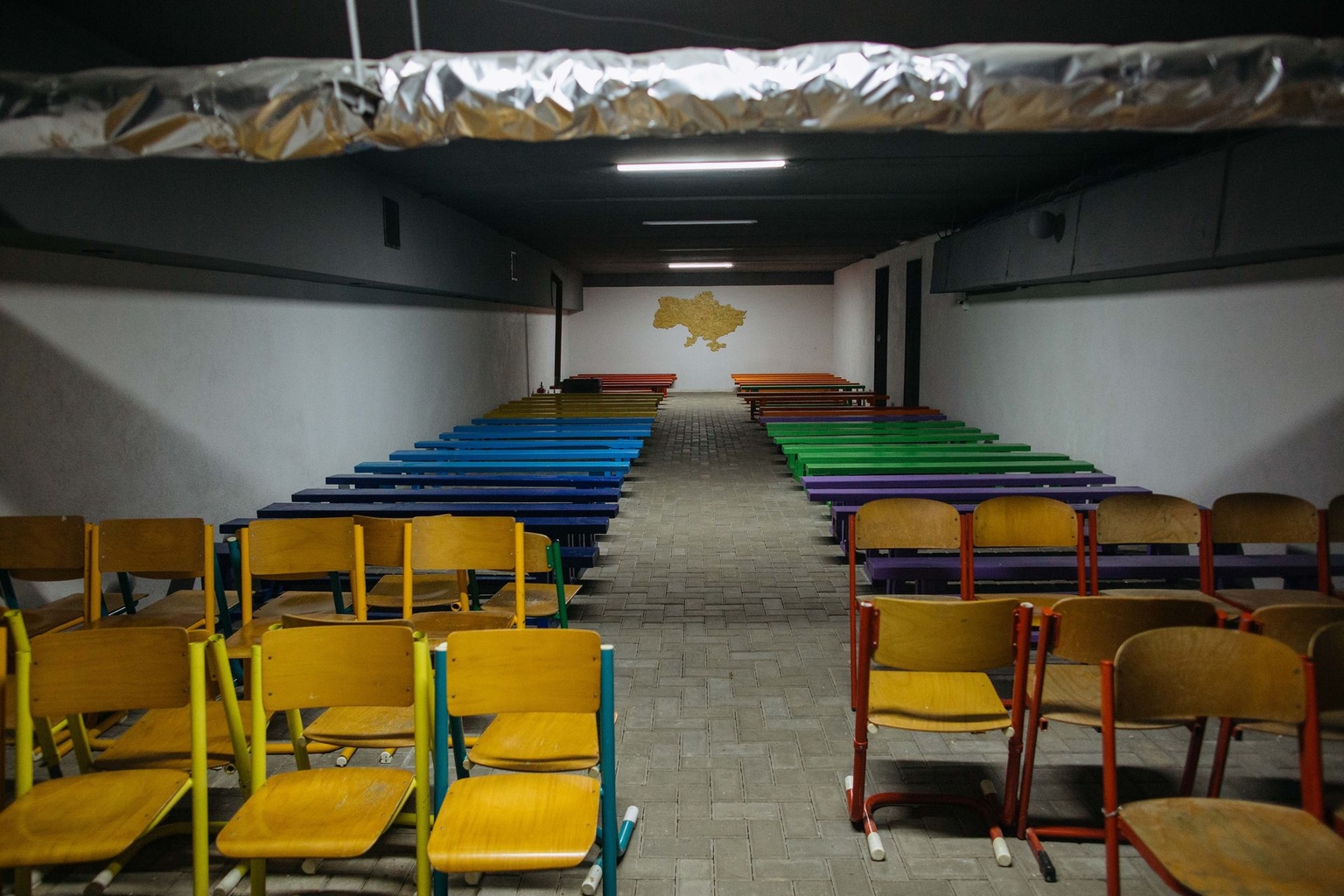 A wood-burning stove heats a basement shelter at a school in Lutsk, Volyn Oblast, Ukraine, on Oct. 22, 2026.