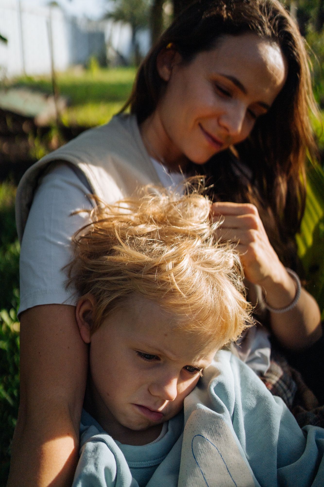 Nina Shkurba hugs her s 9-year-old son, Veniamin, in the Osokorky neighborhood of Kyiv, Ukraine, on Oct. 4, 2026.