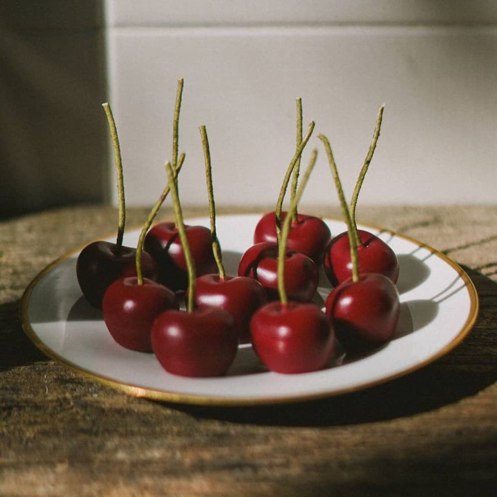 Cherry shaped beeswax candles by Ukrainian brand Prosto Mykola