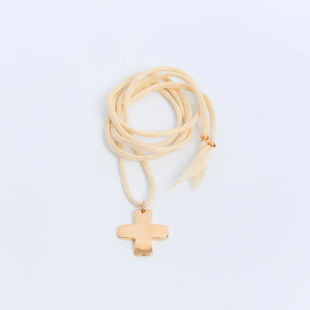 Cross pendant on silk cord by Ukrainian brand Lutiki