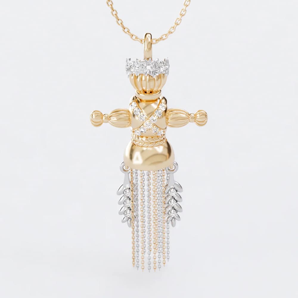 Gold Malanka doll pendant by Ukrainian brand Dukachi