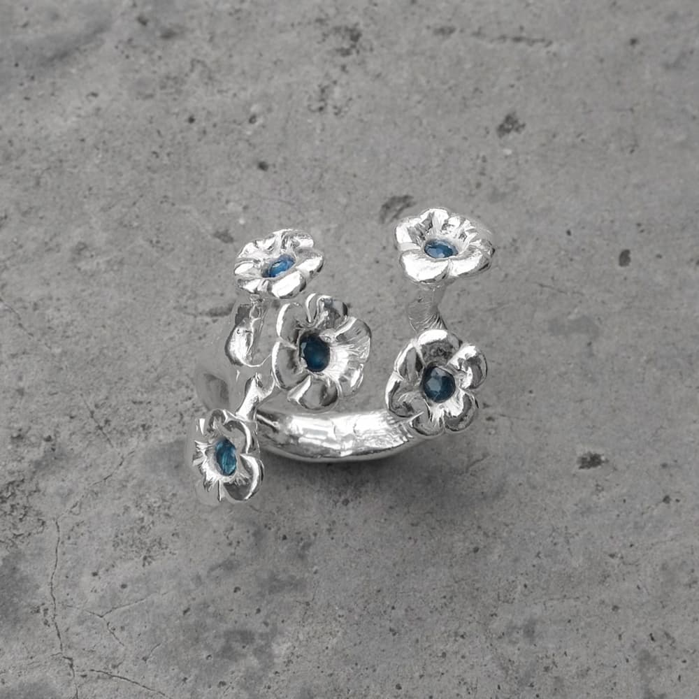 Hand sculpted silver Forget Me Not ring by Decline