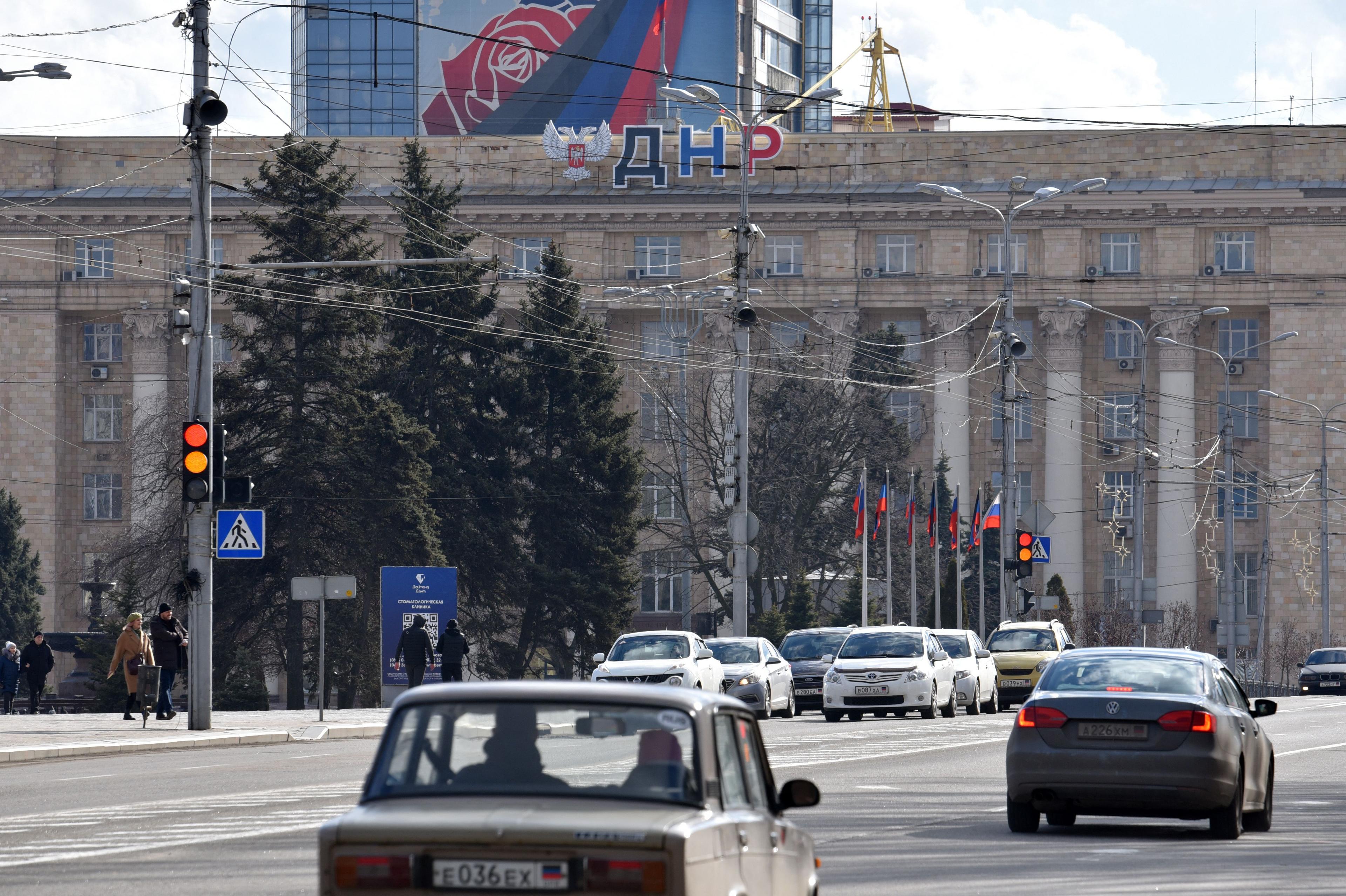 Ukrainians inside occupied Donbas stuck between hope and fear
