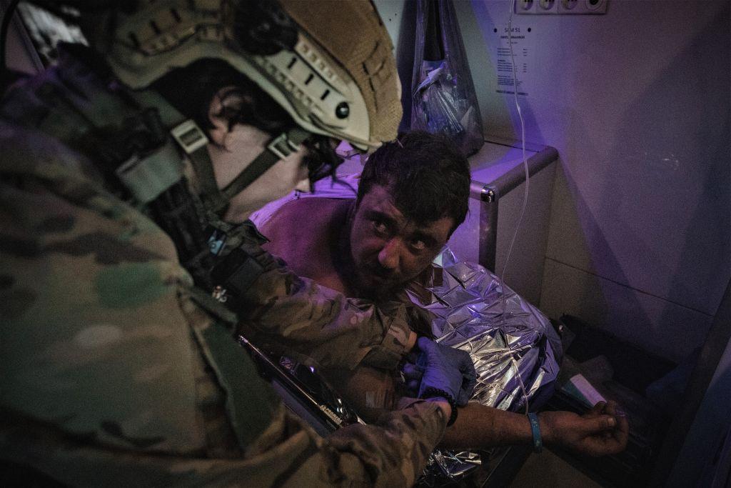Wounded soldiers are taken care of by 3rd Assault Brigade medics near Bakhmut