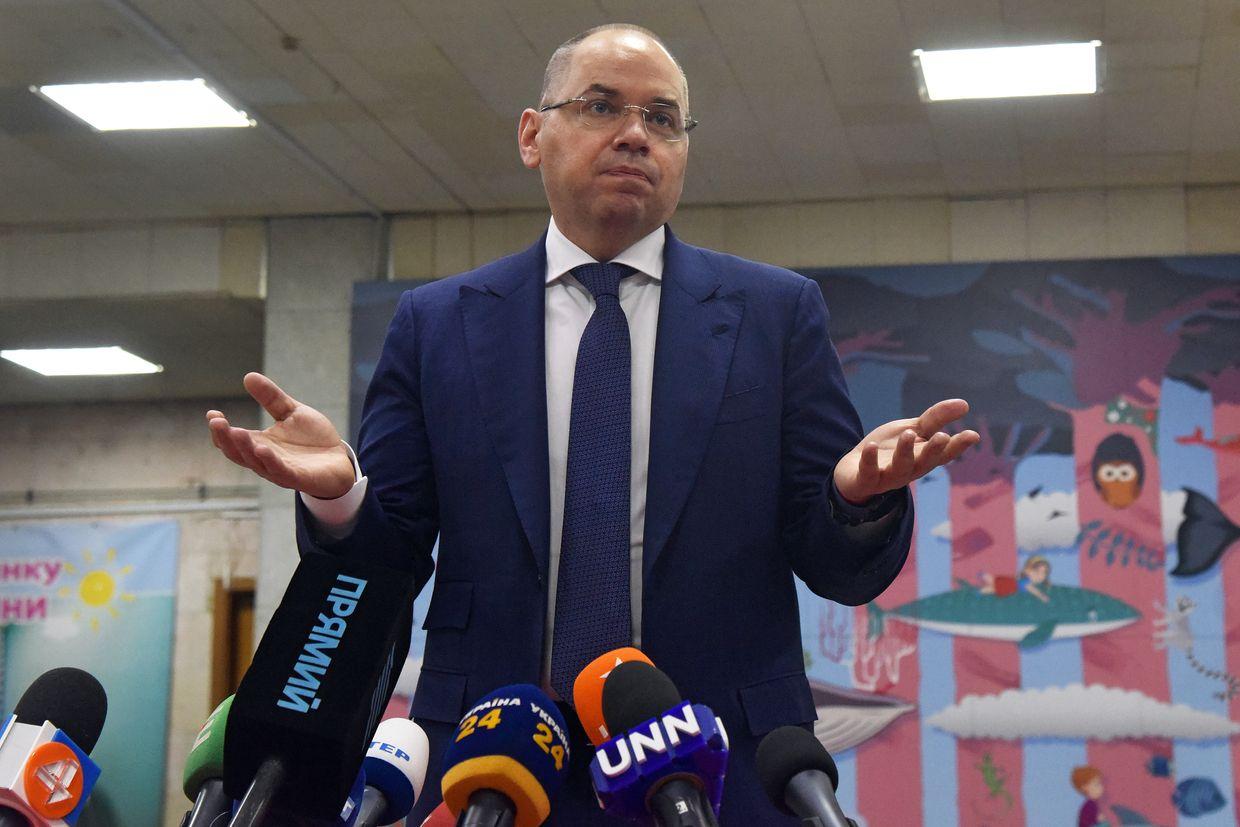 Ex-health minister issued arrest warrant in absentia