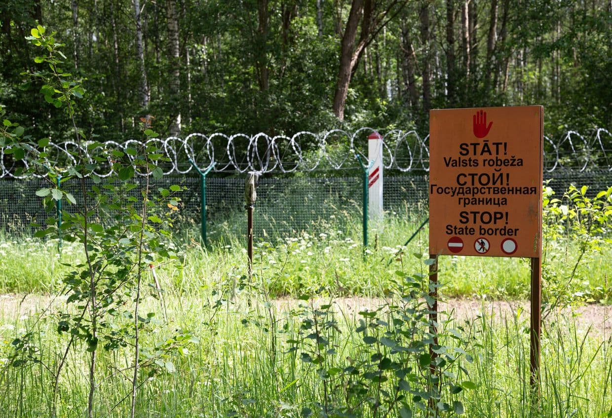 Armed individuals from Belarus threaten Latvian soldiers at border, followed by another breach
