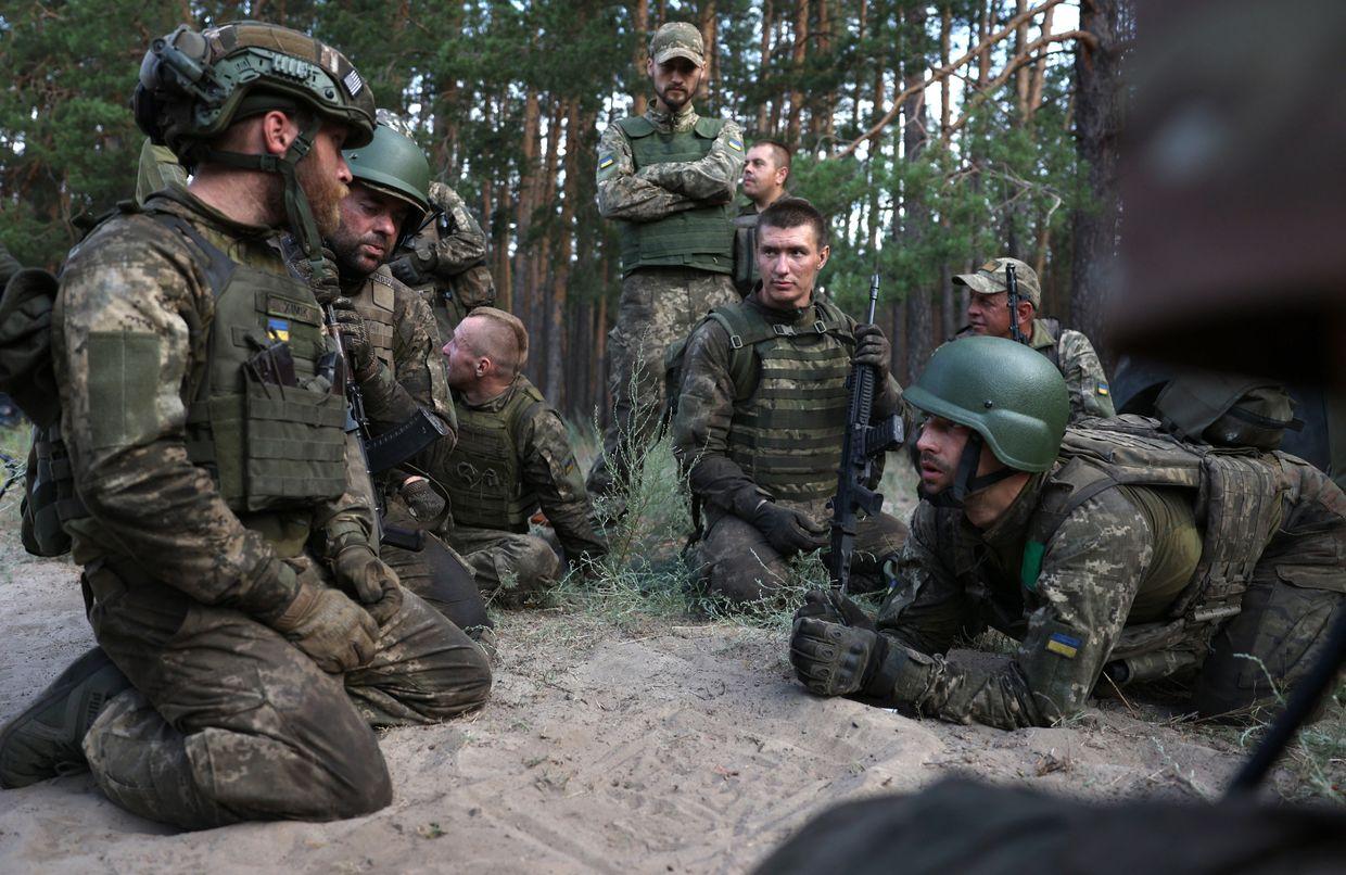  Ukrainian infantrymen of the 49th Carpathian Sich Battalion train in Donetsk Oblast, Ukraine, on July 19, 2024.