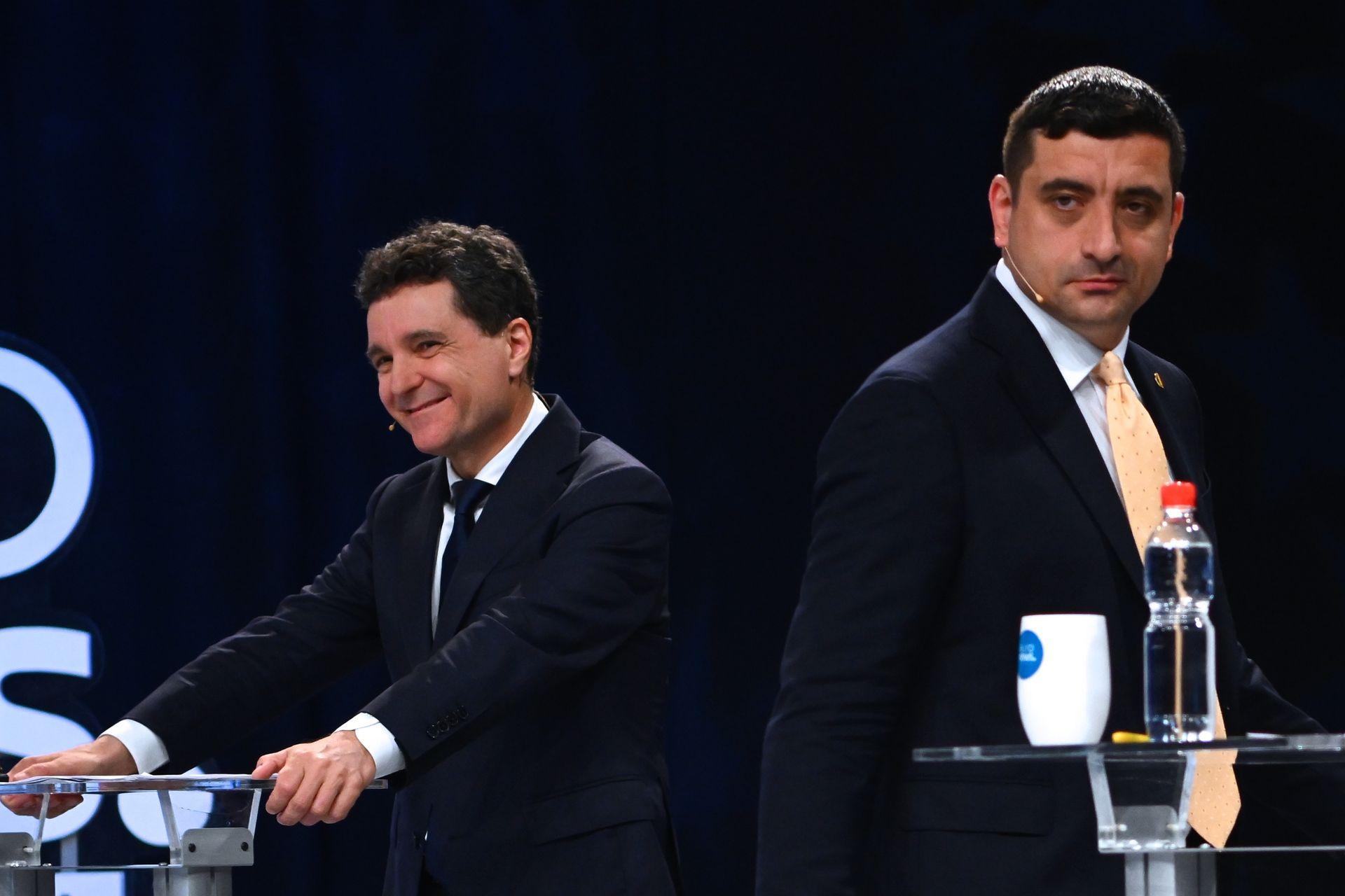 Bucharest Mayor Nicușor Dan (L) attends a electoral debate with George Simion (R) in Bucharest, Romania, on May 8, 2025. 