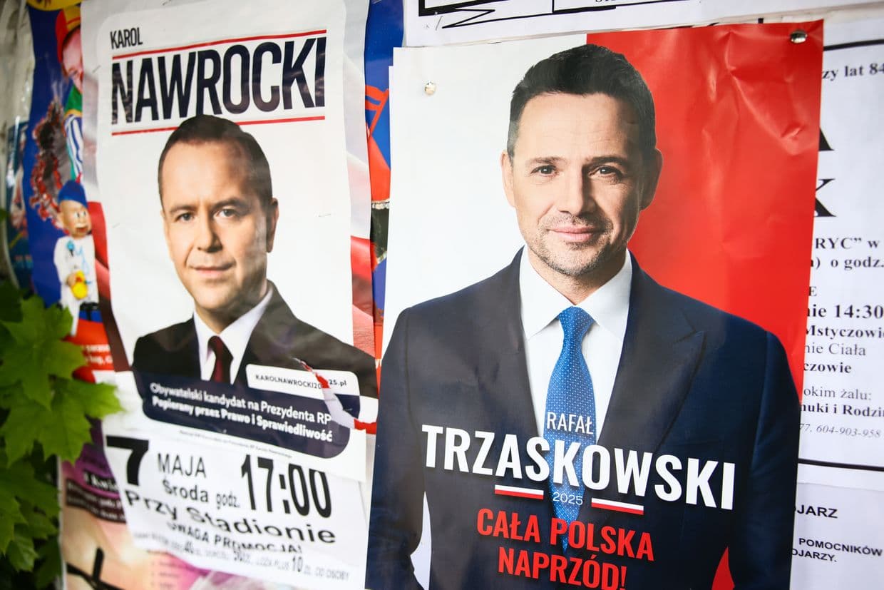 Campaign posters of Rafal Trzaskowski and Karol Nawrocki are seen in Sedziszow, Poland, on May 16, 2025