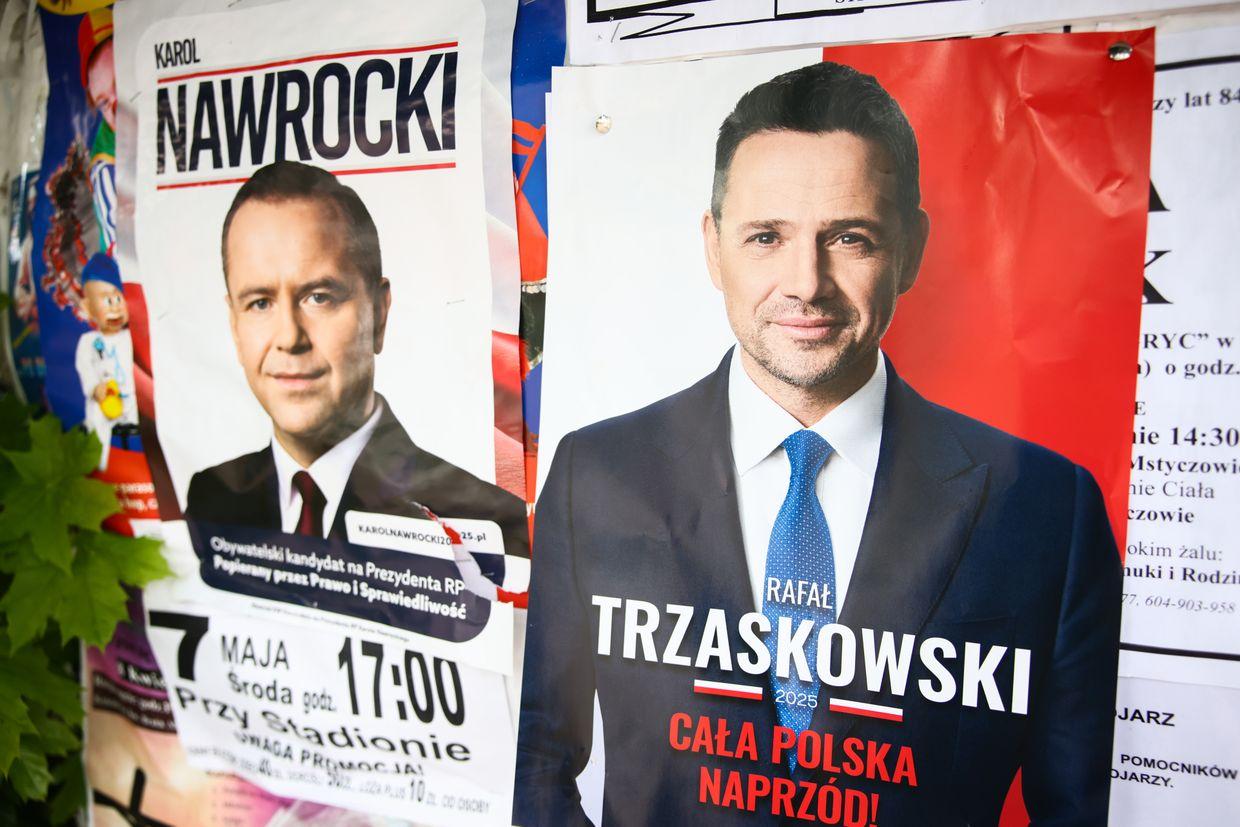 Campaign posters of Rafal Trzaskowski and Karol Nawrocki are seen in Sedziszow, Poland, on May 16, 2025