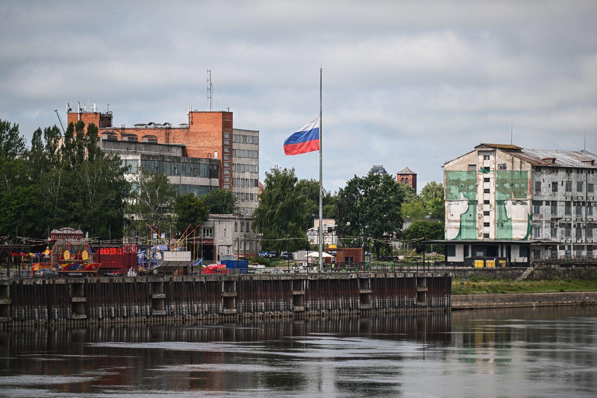 A Russian flag is seen from Pagegiai, Lithuania, separated by the river from the Kaliningrad Oblast, on July 10, 2023.
