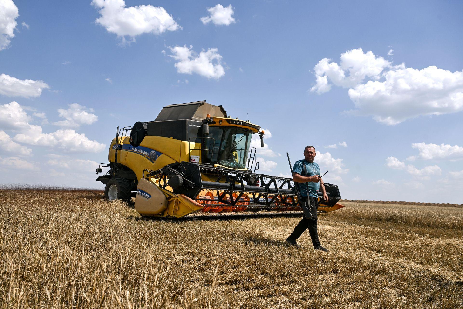 combine harvester near Orikhiv, Zaporizhzhia Oblast, Ukraine, located six kilometers from the front line, on July 8, 2025.