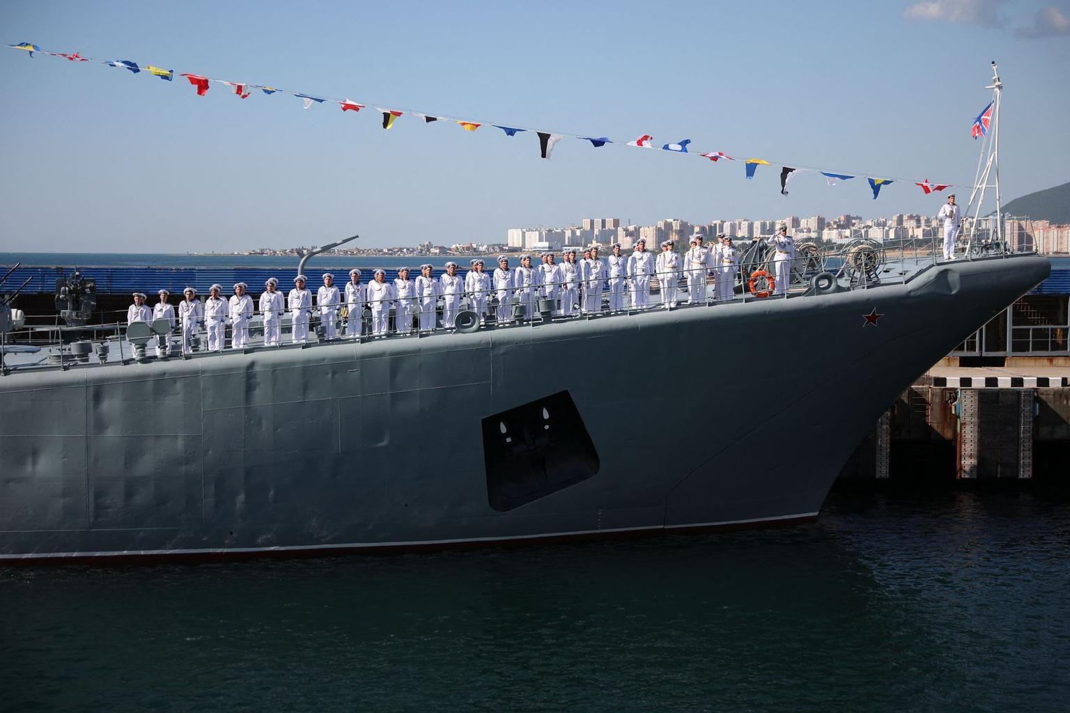 Sailors stand at attention on the deck of a Russian Black Sea Fleet warship in Novorossiysk, Russia, on July 30, 2023.