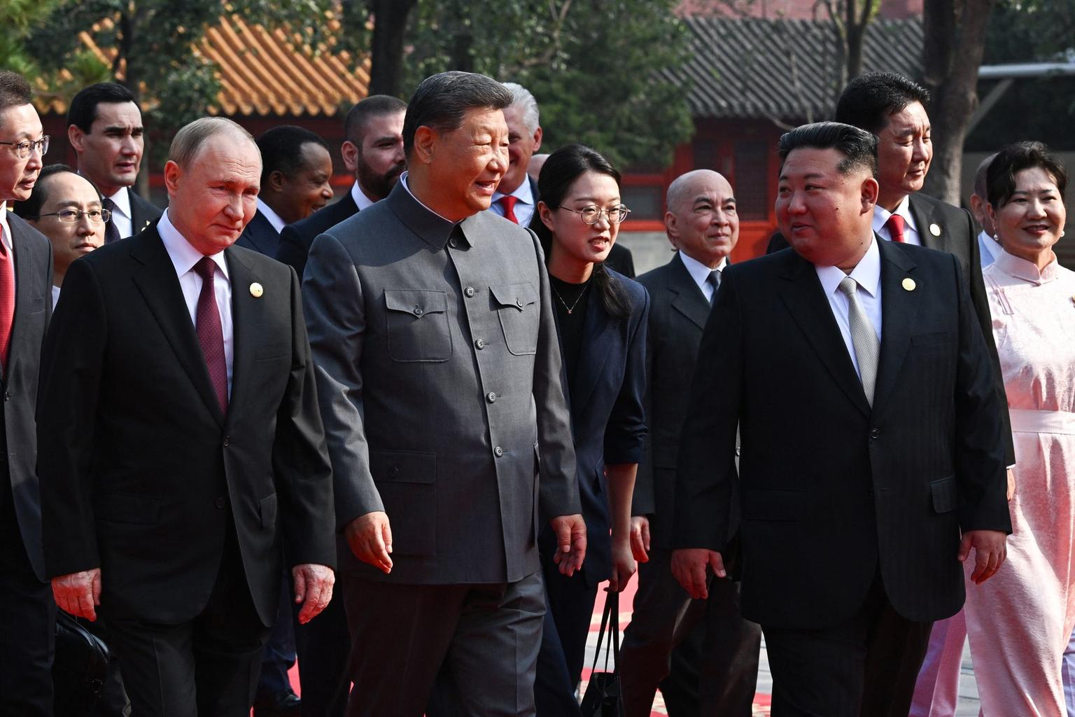 Putin, Kim join Xi at military parade in China as Trump says they 'conspire against' US