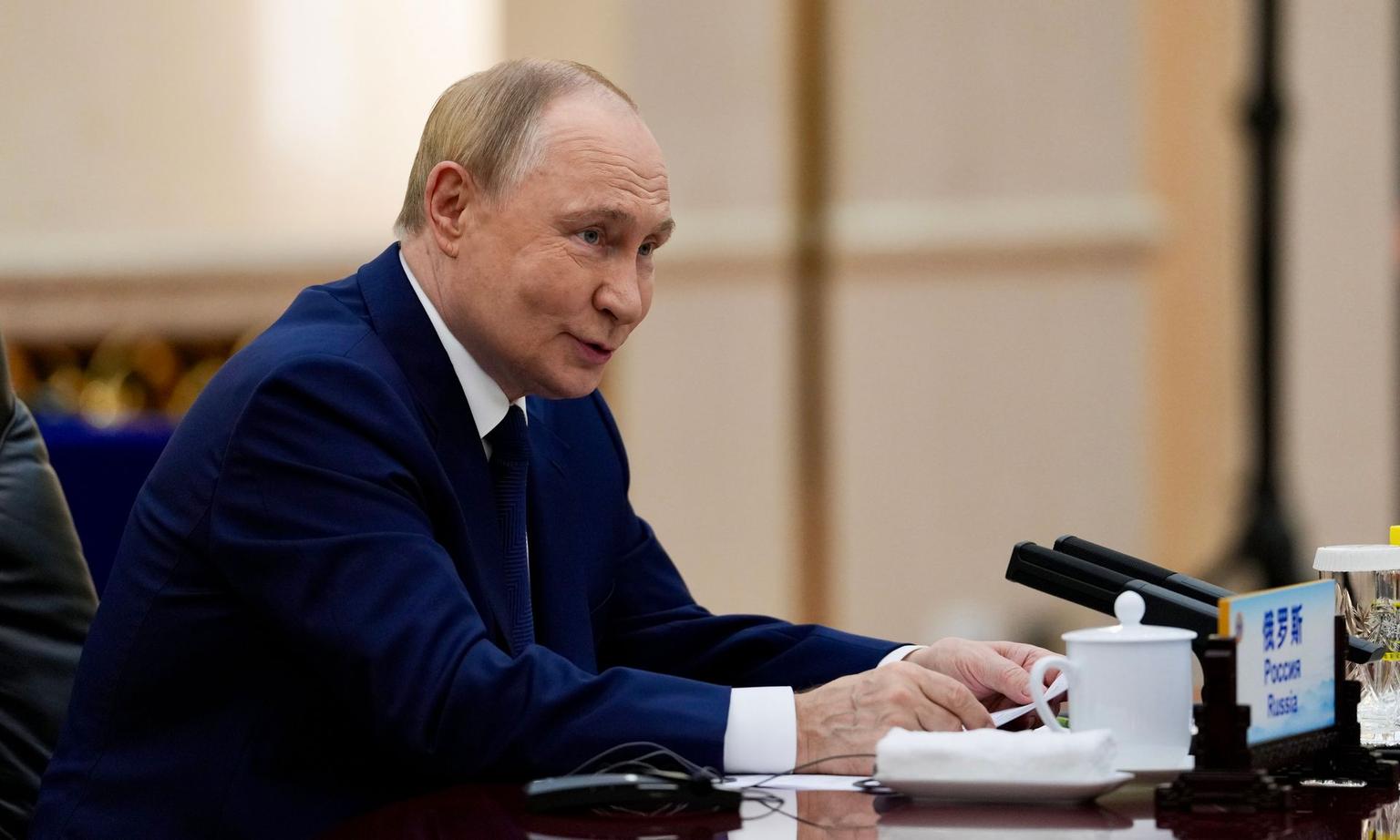 Hot mic captures Putin musing about biotechnology, immortality at Beijing parade