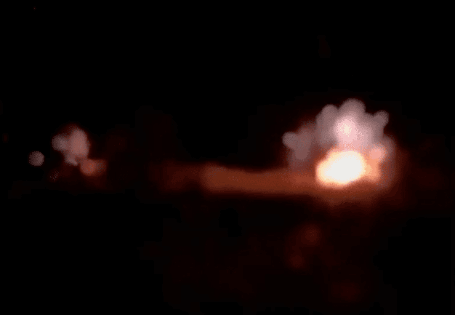 An explosion occurs in the dark