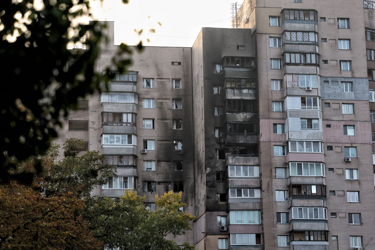 A residential building stands damaged after a Russian strike in Kyiv, Ukraine, on Oct. 22, 2025. 