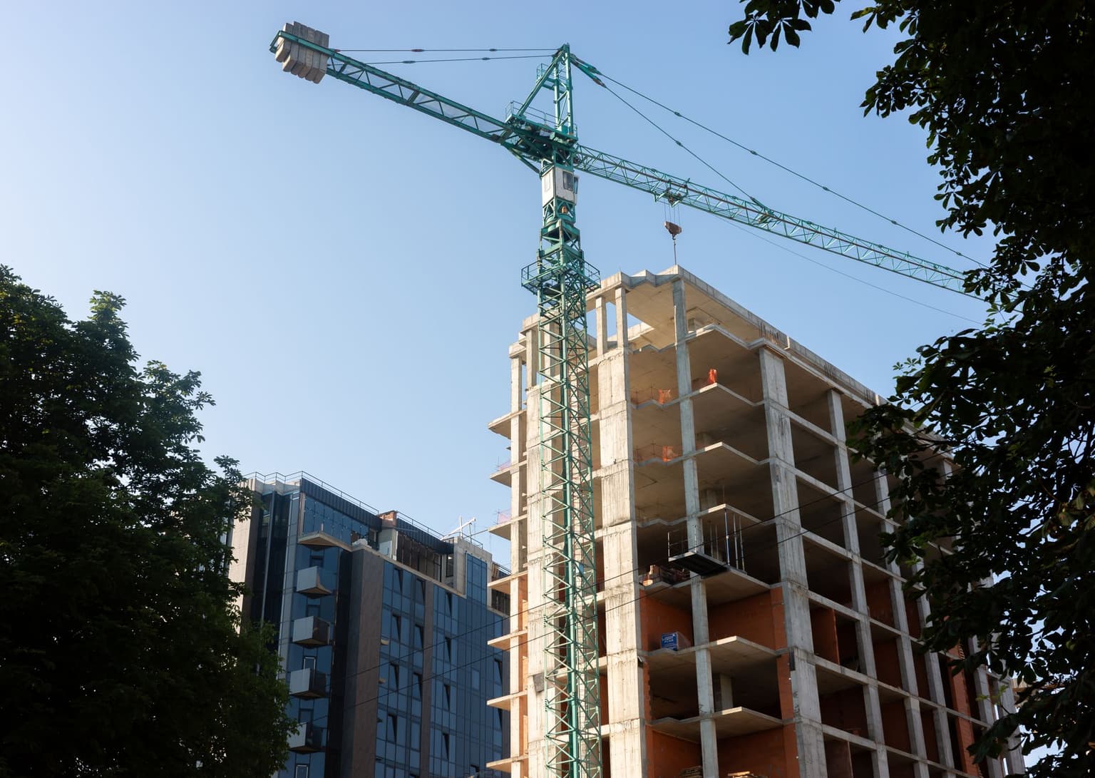 New residential buildings rise amid ongoing construction in Uzhhorod, Ukraine, on June 16, 2025.