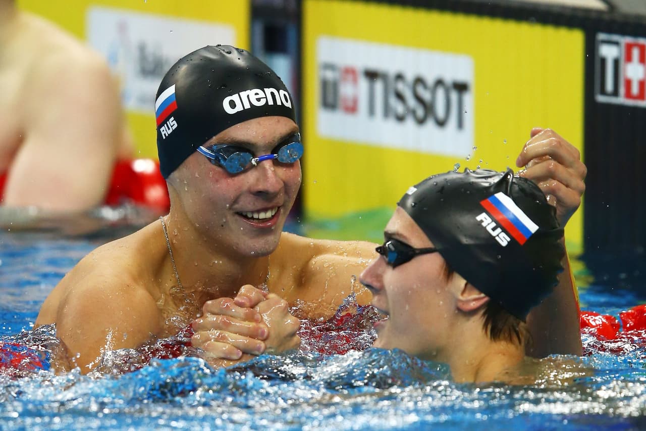 Russian, Belarusian swimmers allowed to compete under national flags after ban lifted