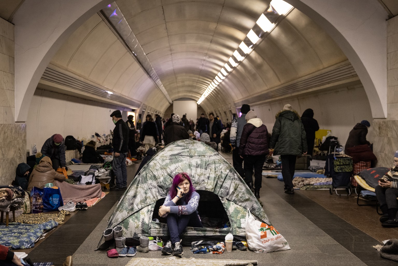 Covid-19 patients face dilemma of infecting others while hiding in bomb shelters