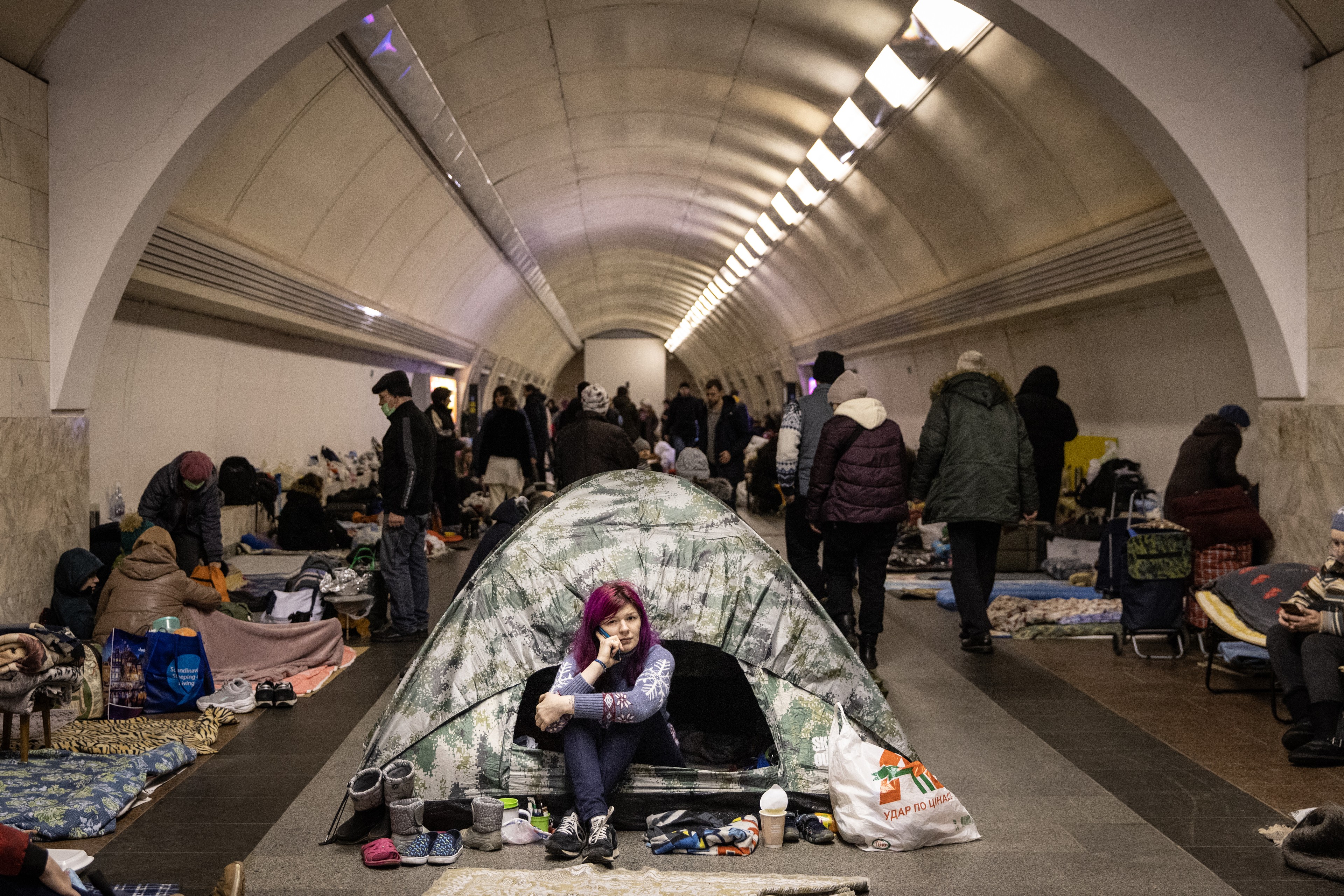 Covid-19 patients face dilemma of infecting others while hiding in bomb shelters