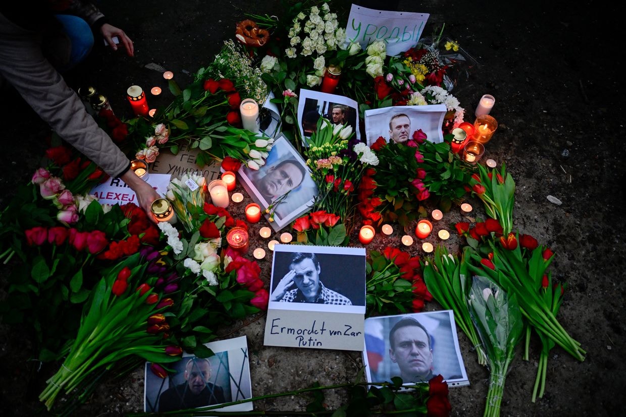 Flowers and candles laid for Alexei Navalny in February 2024 in Berlin, Germany.