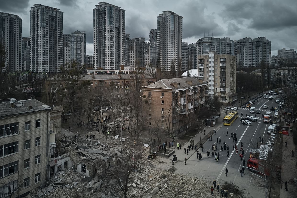 Missiles hit Kyiv seconds after air raid alert, leaving people no time to shelter