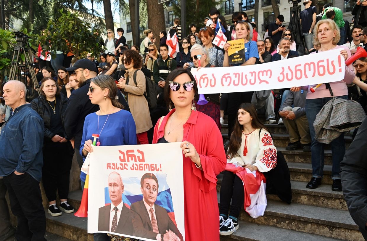 Georgians head out to vote in parliamentary elections, tensions run high at some polling stations