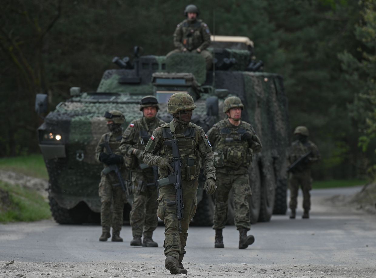 Polish soldiers seen before a high-intensity training session using M1A2 Abrams tanks at Nowa Deba