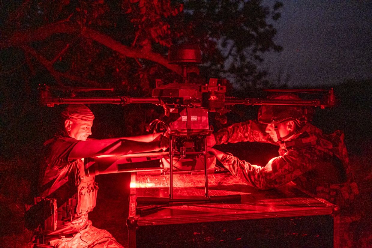 Ukrainian soldiers from 121st Brigade load a Vampire drone in Krasnohorivka, Donetsk Oblast, Ukraine, on July 22, 2024. 