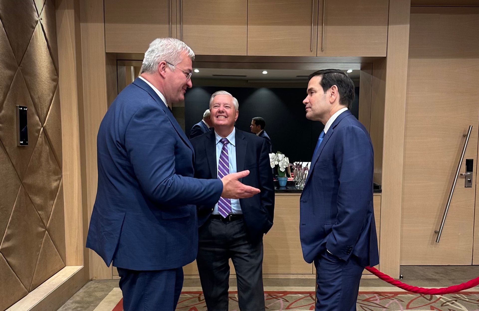 Foreign Minister Andrii Sybiha, U.S. Secretary of State Marco Rubio, and Republican Senator Lindsey Graham greet each other