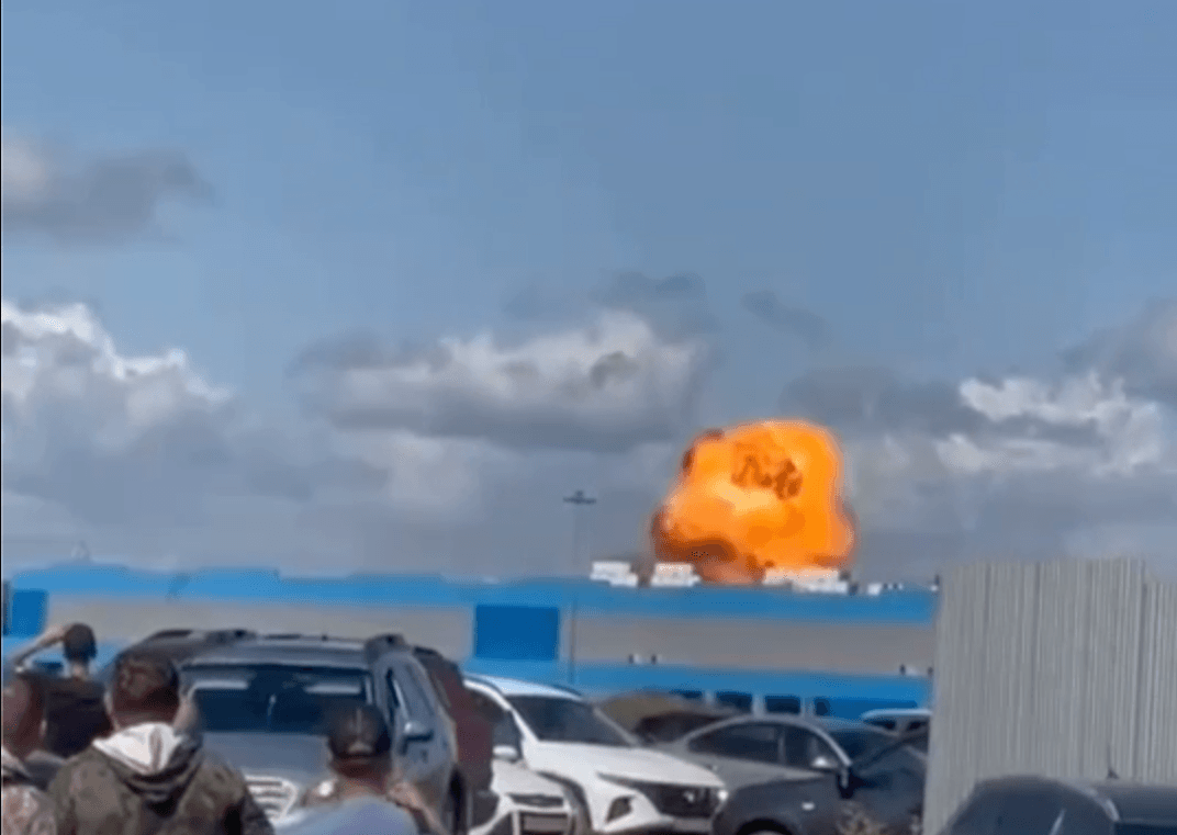 Screenshot from a video reportedly showing a Ukrainian drone striking a warehouse storing Russian drones in Kizil-Yul, Russia, on Aug. 9, 2025.
