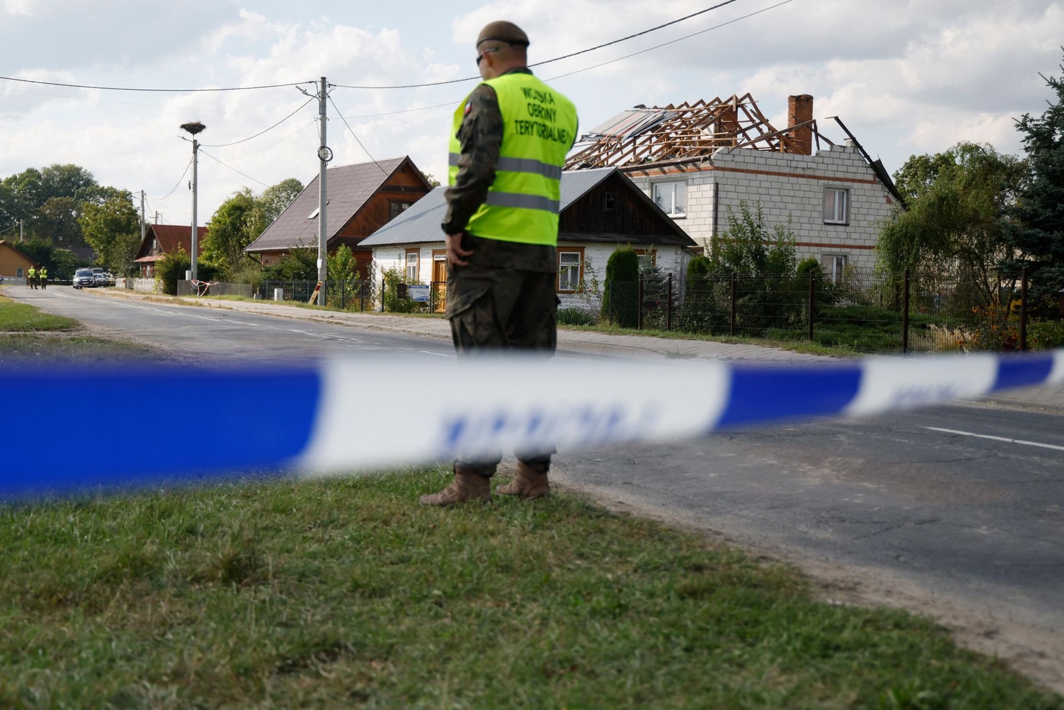 Police and army inspect damage to a house destroyed by debris from a shot down Russian drone in the village of Wyryki-Wola, eastern Poland, on September 10, 2025 (Wojtek Radawanski/AFP via Getty Images)