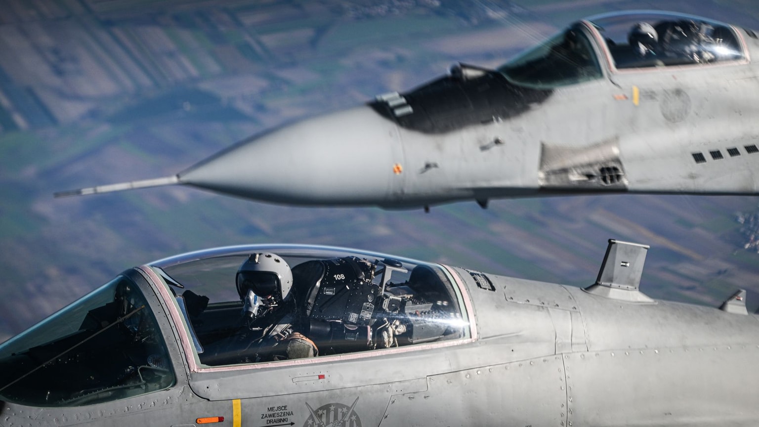 Polish Air Force MiG-29 fighter jets take part in a NATO shielding exercise at the Łask Air Base, Poland, on Oct. 12, 2022.
