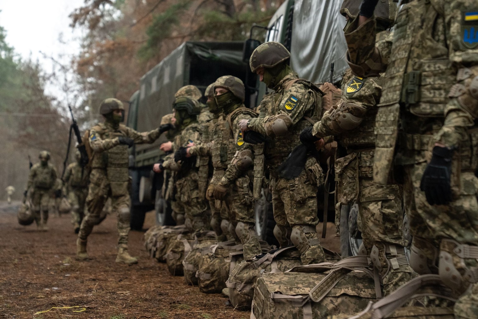 The recruits undergo initiation in the 92nd Assault Brigade in Kharkiv Oblast, Ukraine, on March 16, 2025. 