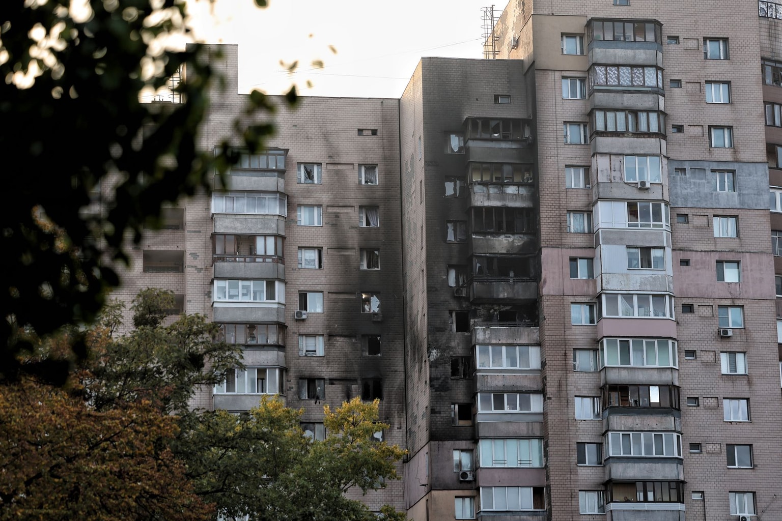 A residential building stands damaged after a Russian strike in Kyiv, Ukraine, on Oct. 22, 2025. 