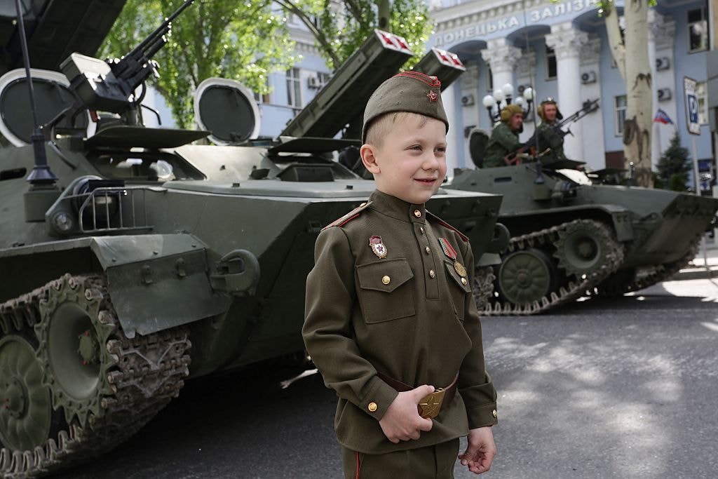 Russia tightens grip on occupied Ukraine with illegal mobilization and child militarization, experts warn