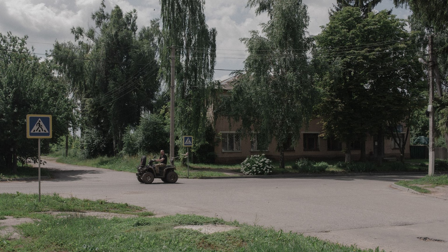 A Ukrainian army soldier drives a buggy in a frontline area of Sumy Oblast, Ukraine on June 28, 2025.