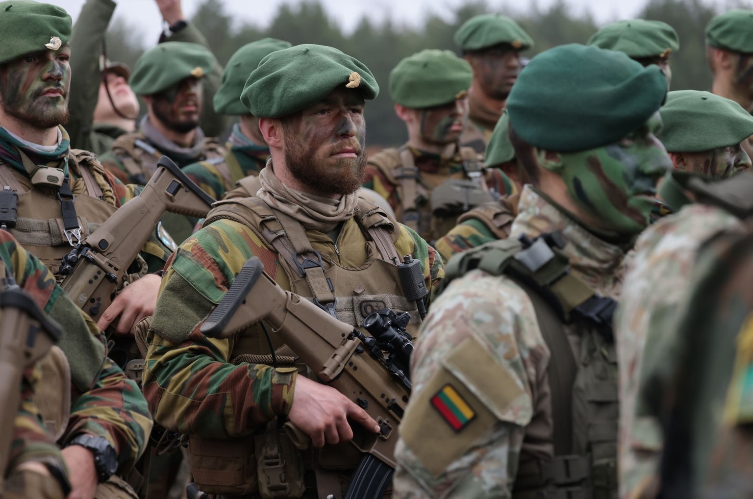 Belgian and Lithuanian troops during the NATO Iron Wolf military exercises in Pabrade, Lithuania, on Oct. 26, 2022. 