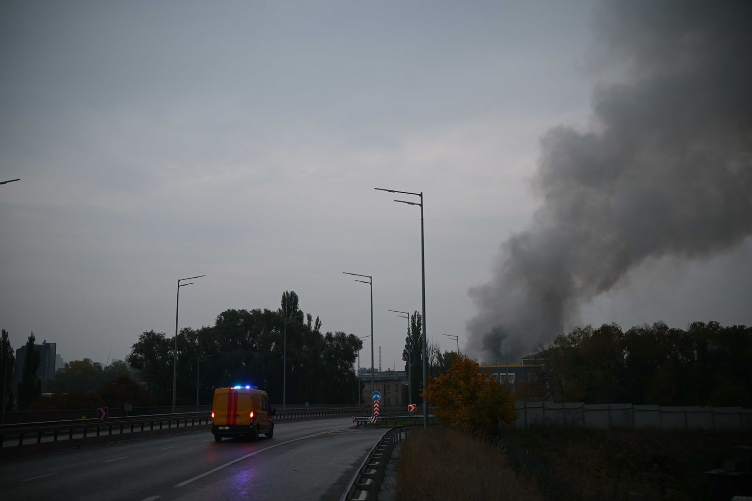 Smoke rises from Kyiv's Southern Bridge after a Russian missile attack