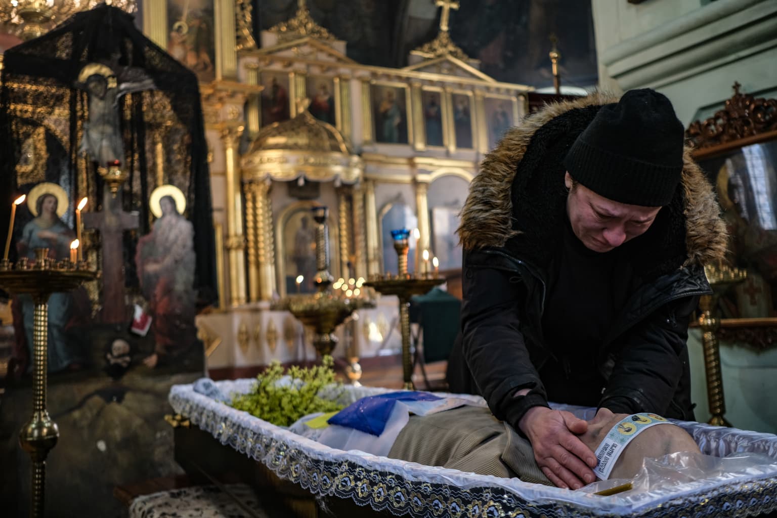 Kyivans bury husband and father gunned down by Russian troops