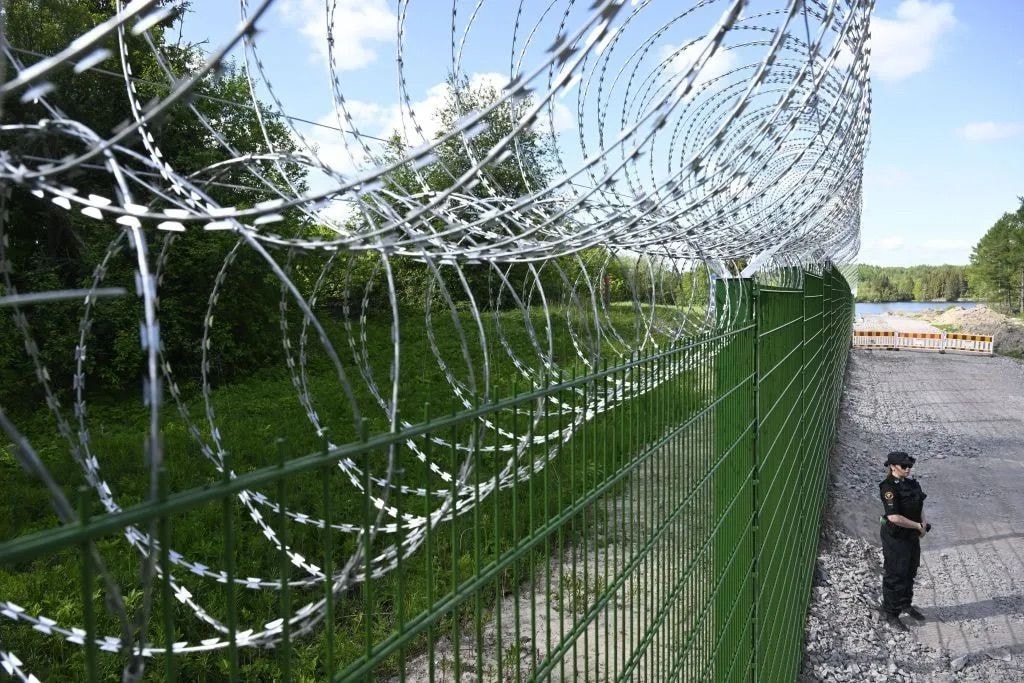Norway considering building fence along Russian border to curb migrant crossings