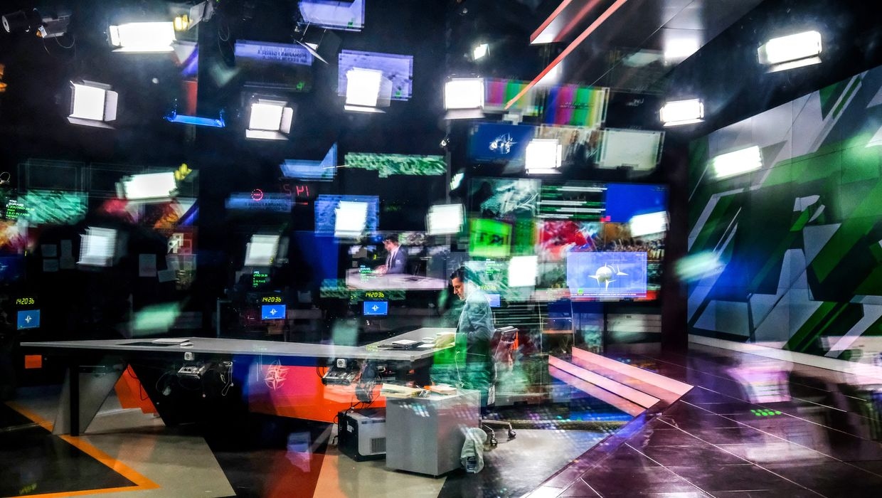 An unidentified anchor of the Russia Today (RT) TV company as they prepare to go on the air in their studio in Moscow, Russia, on June 8, 2018.