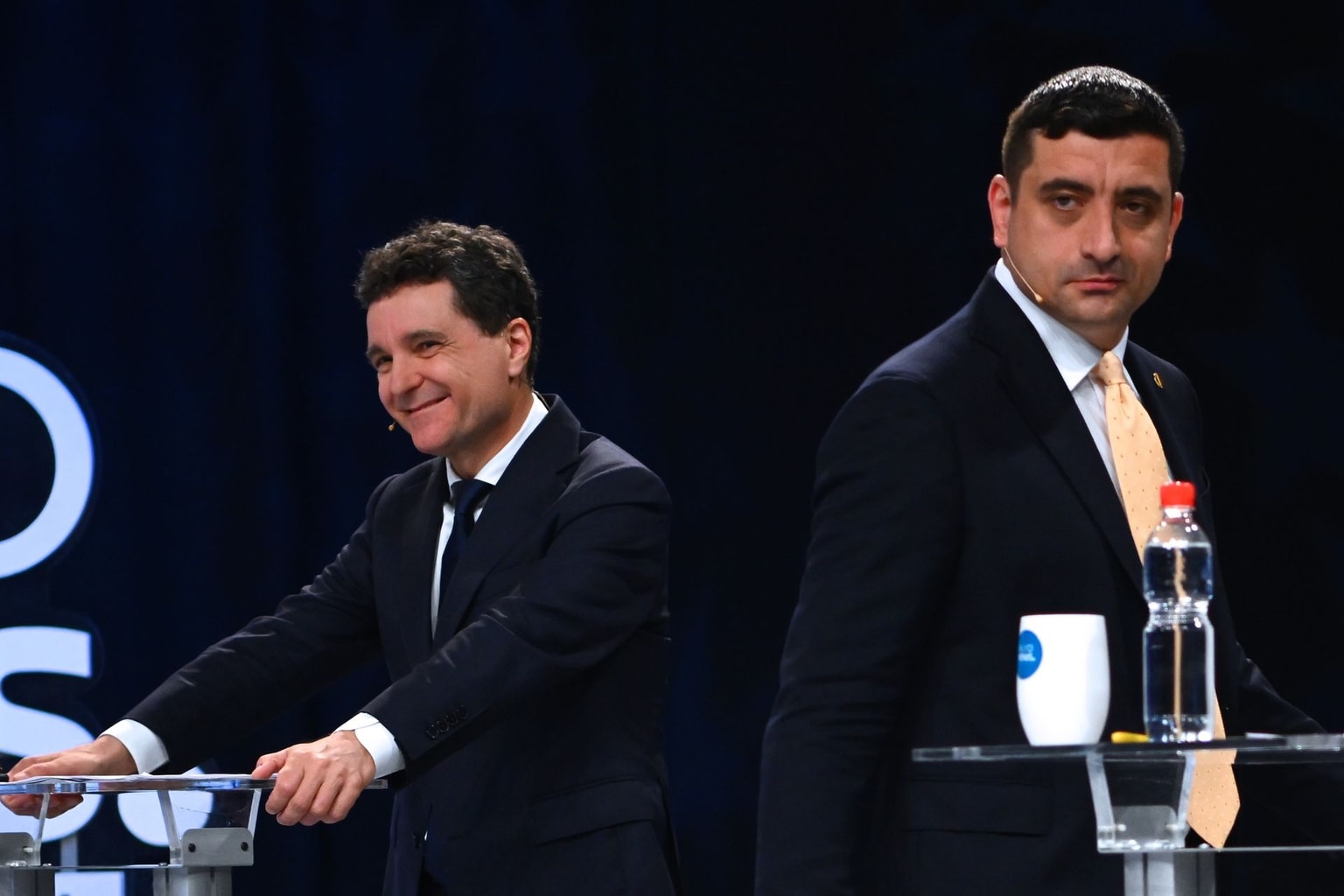 Bucharest Mayor Nicușor Dan (L) attends a electoral debate with George Simion (R) in Bucharest, Romania, on May 8, 2025.