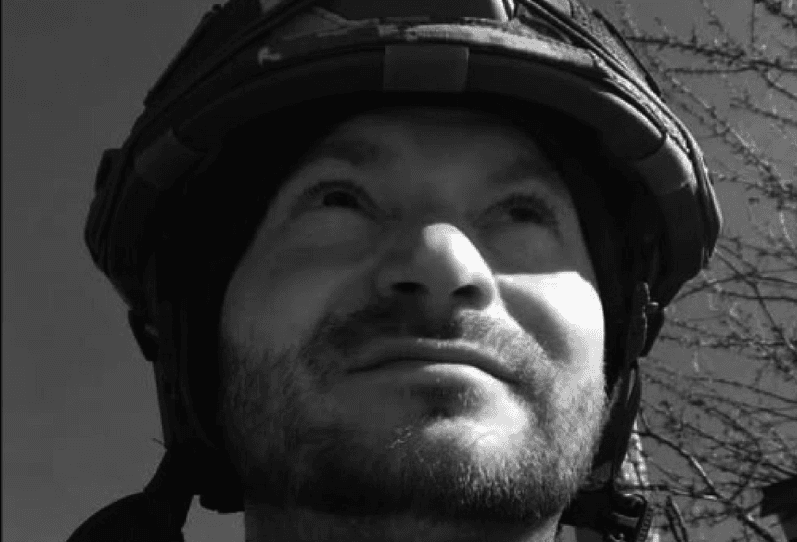 Former actor Maksym Kovtun, depicted wearing a military helmet in this undated photo, was killed on the front line.