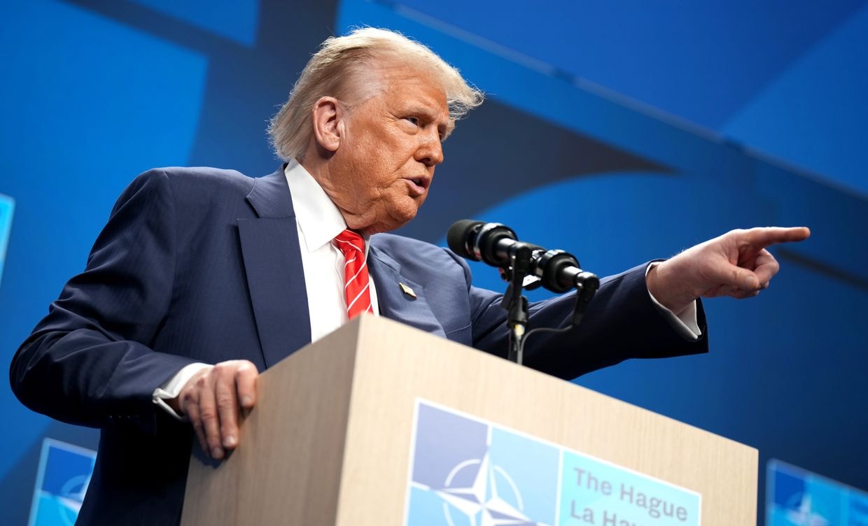 Donald Trump gestures as he speaks to the press following the NATO summit in The Hague, Netherlands, on June 25, 2025.