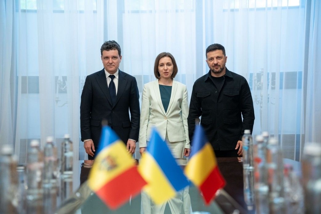 President Volodymyr Zelensky, Moldovan President Maia Sandu, and Romanian President Nicusor Dan pose for a photo during a trilateral meeting in Kyiv, Ukraine, on June 12, 2025.