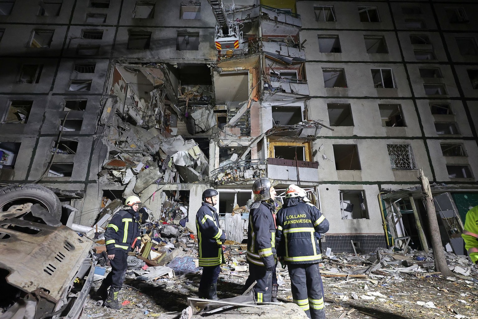 Rescuers work at the site of a residential building destroyed by a Russian glide bomb in Kharkiv, Ukraine, on Oct. 31, 2024.